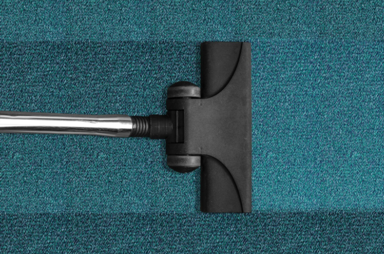 VACUUM CLEANING CARPET